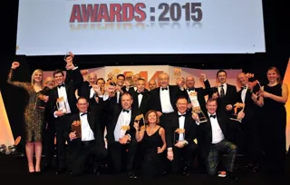 AM Awards 2015 winners photographed together on stage at the ICC Birmingham