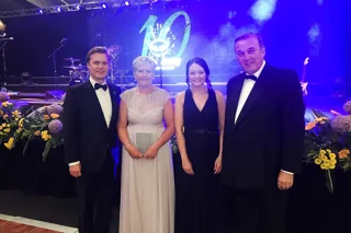 Alison Gilchrist (second left) collects Aberdeen Jaguar Land Rover's the Partner of the Year Award from (left to right): Peter Vardy, Claire Maith and Sir Peter Vardy