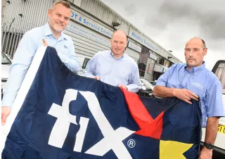 Mark Hutchins, business development manager for Fix Auto UK, with Frazer Phipps and Ivan Simonowski , owners of Headley Bodyshop/Fix Auto Newbury.  