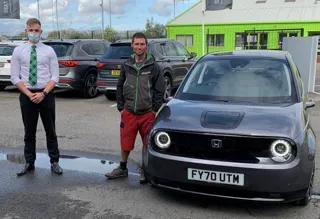 Guy Martin purchases Honda e at DM Keith Honda branch in Grimsby