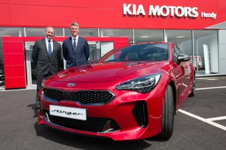 Hendy Group chief executive Paul Hendy (left) with Paul Philpott, president and CEO, Kia Motors (UK) at the opening of the new Kia Hendy showroom in Portsmouth with the new Kia Stinger