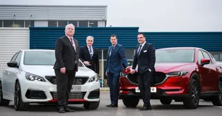 Snows Group's newly acquired dealership Portfield in Chichester, West Sussex (from left): John Lindsay (Peugeot Sales Manager), Graham Simpson (Group Aftersales Manager), Neil McCue (Group Board Director) and John Harkness (Mazda Sales Manager)