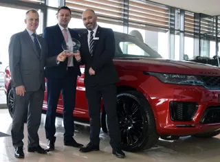 Charles Hust Land Rover celebrates (left to right): Andrew West, Jaguar Land Rover customer service director; Andrew Gilmore, Charles Hurst Group aftersales director; and Glenn McCartney, Charles Hurst Jaguar Land Rover aftersales manager