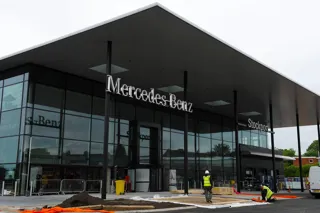 The façade of LSH Auto's Mercedes-Benz Stockport dealership