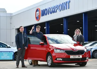 From left: Olivia and Peter Crowther with Mark Jones, sales manager at Motorpoint Birmingham