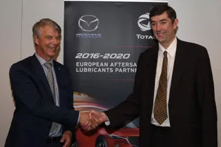 Jorgen Olesen, director of Mazda Motor Logistics Europe NV and Philippe Charleux, chairman and CEO of Total Lubrifiants