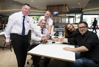 Tam (Mark Cox) reluctantly hands over his wallet to Liam and the team at Motorpoint Glasgow