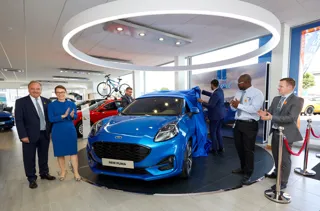 Lisa Brankin, sales director at Ford Motor Company, officially open the new Staines FordStore alongside TrustFord chairman and chief executive, Stuart Foulds