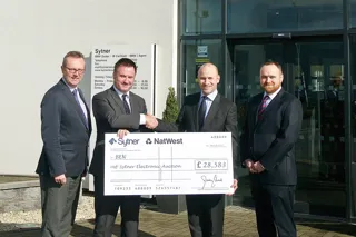 Synter's BEN donation (left to right): Picture  attached: Keith Weaver, Sytner buying manager, Gary Wigginton, head of partnership development at Ben, Darren Edwards, Sytner chief executive and Sebastian Birmingham, Sytner's SEA manager