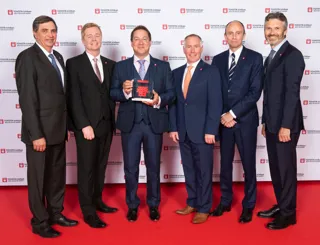 Picture caption (left to right): Dr Johan Van Zyl, president and CEO Toyota Motor Europe; Andrew Harrison, managing director Harry Feeney; Jonathan Jarratt, managing director Oakmere Toyota; Gary Mulvaney, managing director Helensburgh Toyota; Matt Harrison, executive vice president Toyota Motor Europe; Paul Van der Burgh, Toyota GB president and managing director.