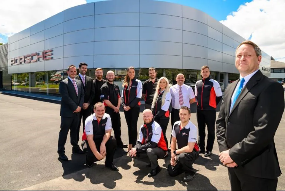 Centre principal, Scott Stevenson (far right), with his team at Porsche Centre Newcastle