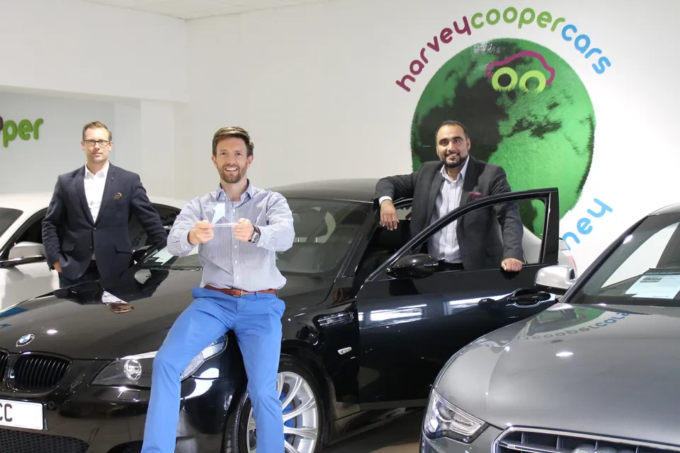 Harvey Cooper Cars managing director Andrew North (centre) with general manager Craig Durham (left) and group operations director Irfan Khalid (right)