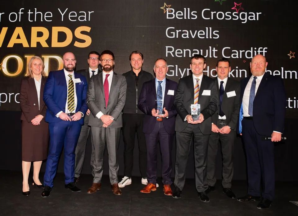 Vincent Tourette, managing director at Groupe Renault UK (centre, in red tie), Dacia UK brand director Louise O'Sullivan (far left), Groupe Renault UK sales director Nick Payne (far right) Groupe Renault corporate design director, Laurens Van Den Acker (centre), with the manufacturers' 'dealers of the year'