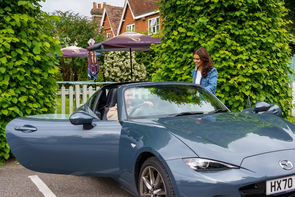 Hendy Group ambassador Lewis McManus and Kenzie Benali with a Mazda MX-5 RF