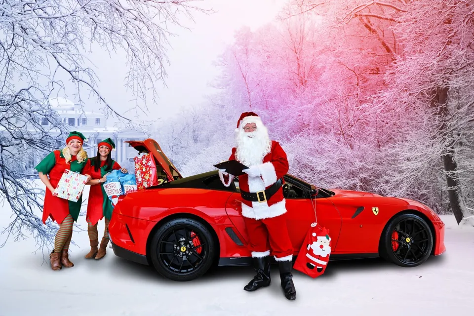 Feeling festive: JCT600 colleagues Kirsty Temple, Nicola Waugh and Gary Wilkinson with a Ferrari 599 GTO