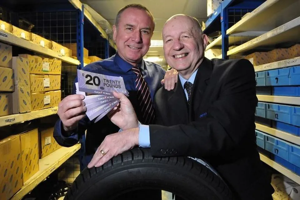 Jennings Group's Kevin Gibbon (left) recognises Allan Etherington's long service