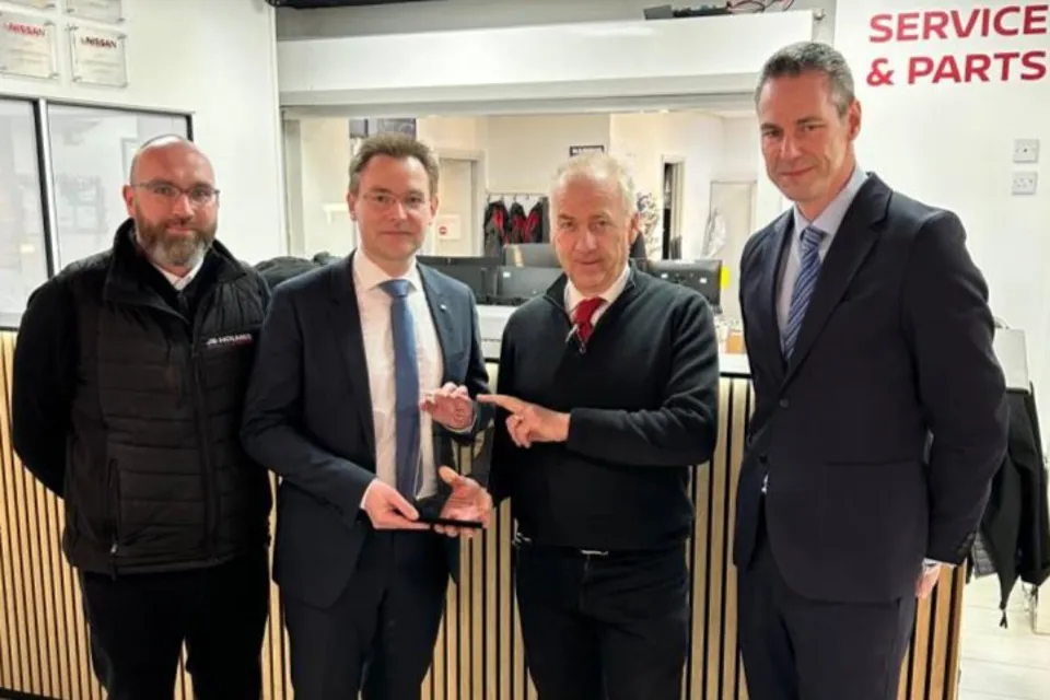 artin Holmes (second right), dealer principal at JS Holmes, receives the company’s award from Nissan aftersales director Nicolas Belaud. Also pictured: Alex Holmes, JS Holmes director and Geoff Ollier, Nissan national aftersales manager.