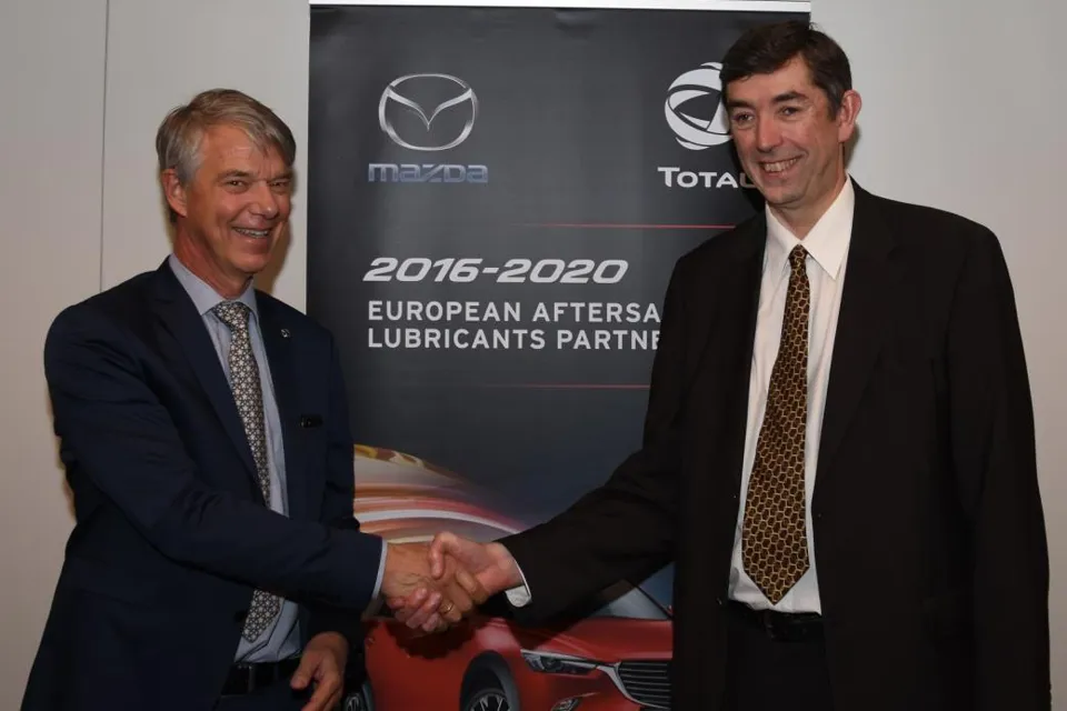 Jorgen Olesen, director of Mazda Motor Logistics Europe NV and Philippe Charleux, chairman and CEO of Total Lubrifiants