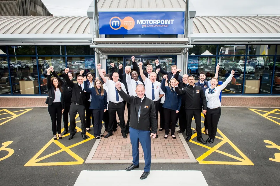 Motorpoint Oldbury’s general manager, John McConnell (front), with his team at the newly-reopened site