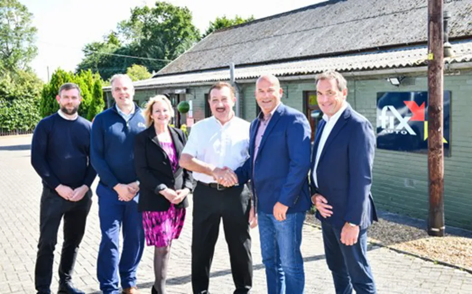  Ian Pugh (second right) cements buying Fix Auto Edinburgh West from previous owners Stewart and Carol Roden. They are accompanied by Stewart and Carol’s son, Michael (far left), bodyshop manager Michael Kinnell and Earl Avann (right), group commercial director Fix Auto UK Owned Sites.