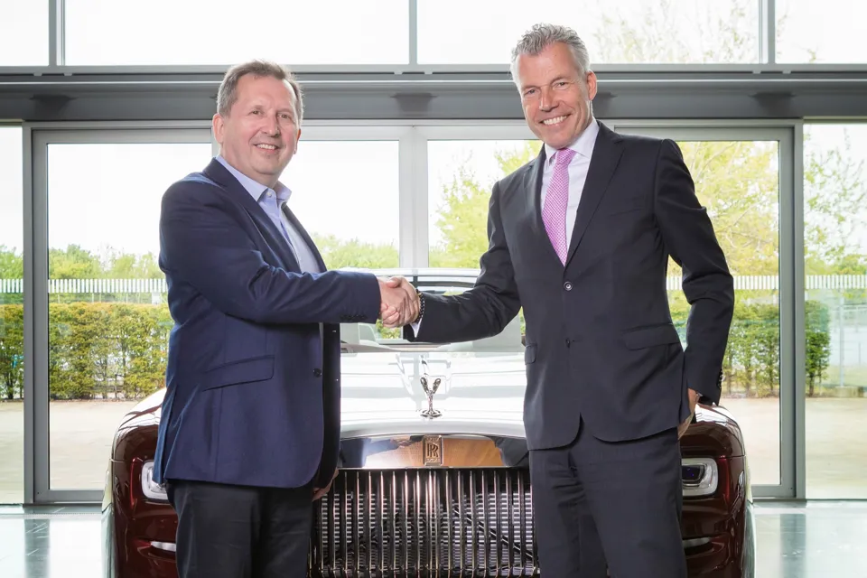 Trevor Finn, chief executive at Pendragon, with Torsten Müller-Ötvös, chief executive officer, Rolls-Royce Motor Cars 
