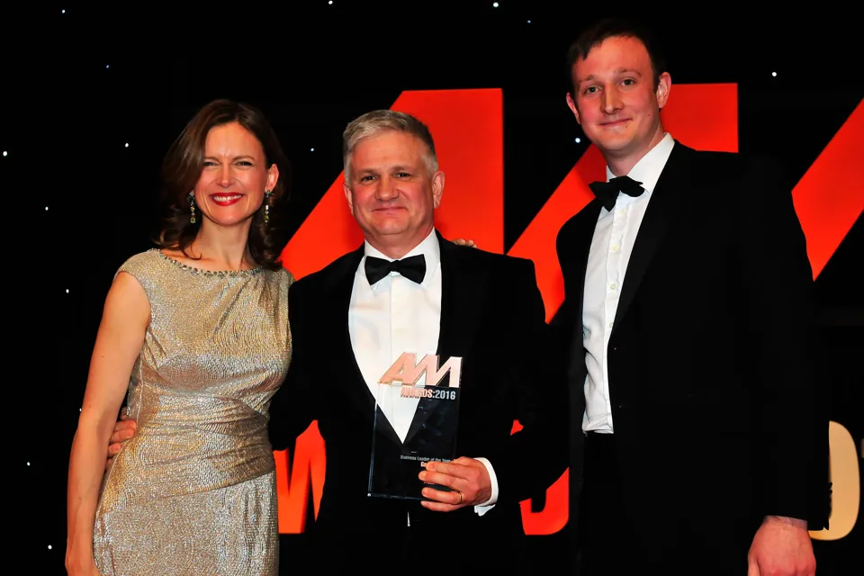 Gary Savage, CEO, Mercedes-Benz UK, accepts his award from host Katie Derham and Simon Webb, head of sales and  development, Premia Solutions (right)