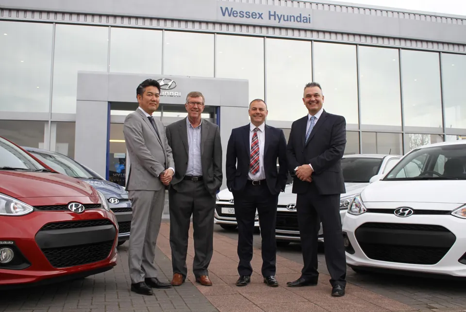 New owners (left to right): Koichi Yoshida, director at VT Holdings, with Steve Patch exiting chairman at Wessex Garages; Keith Brock, managing director at Wessex Garages and Tim Bagnell, managing director and chief executive officer of VT Holdings.